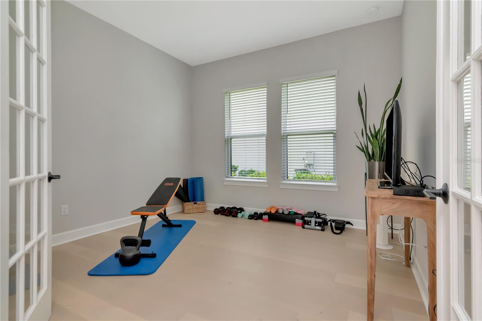Perfect flex or office space with dual french doors and situated in the home for maximum privacy.
