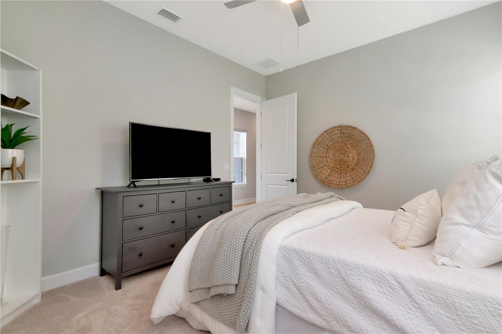 Bedroom 4 with private ensuite and walk in closet.