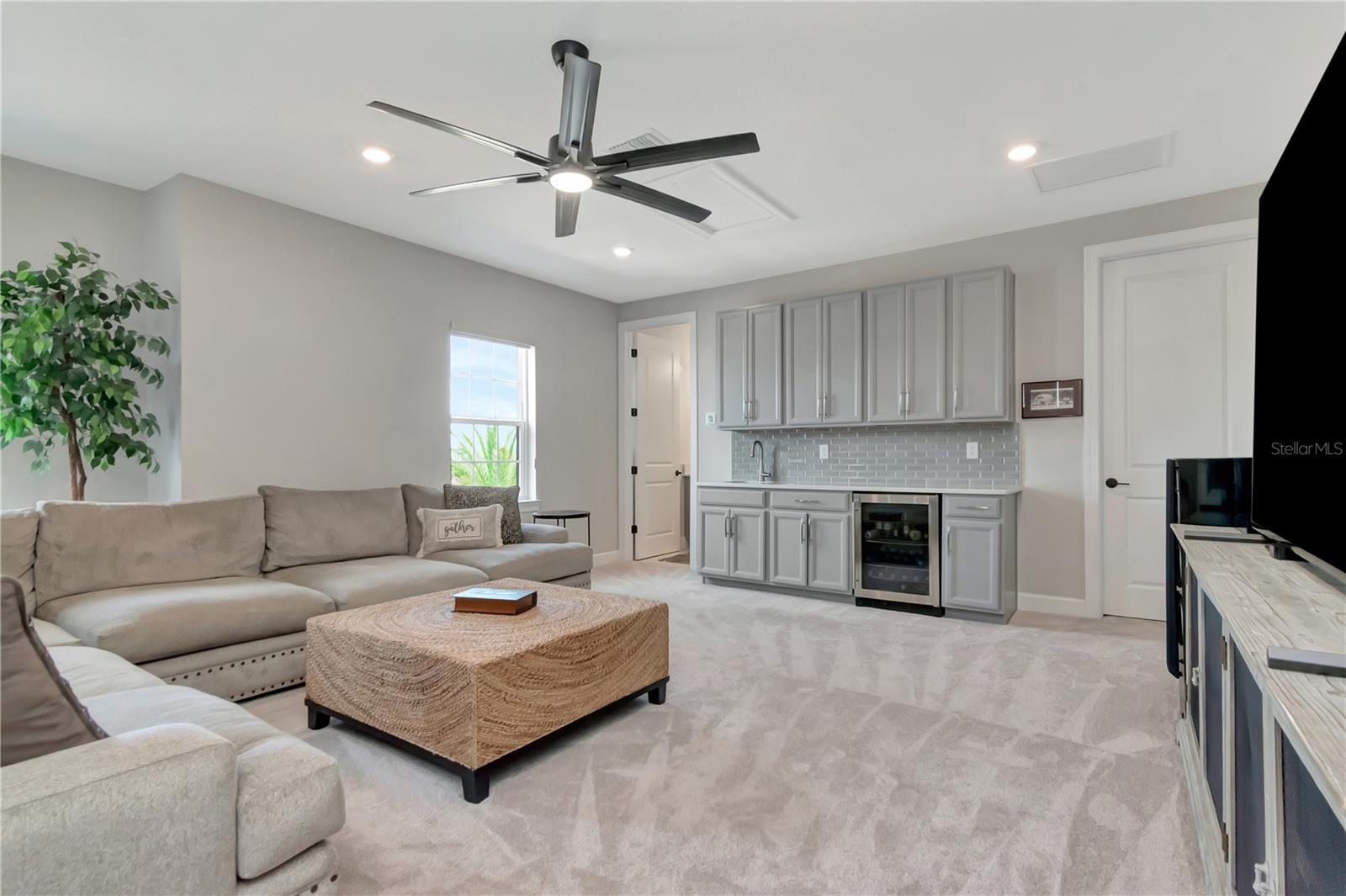 Upstairs Bonus Space with Wet Bar, two Storage closets and a full Bath