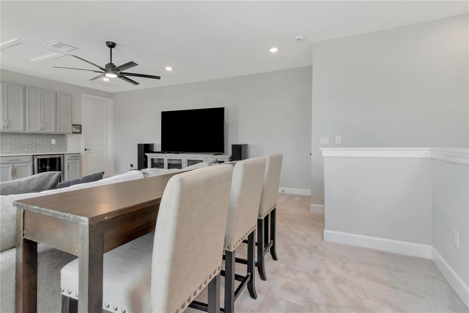 Upstairs Bonus Space with Wet Bar, two Storage closets and a full Bath