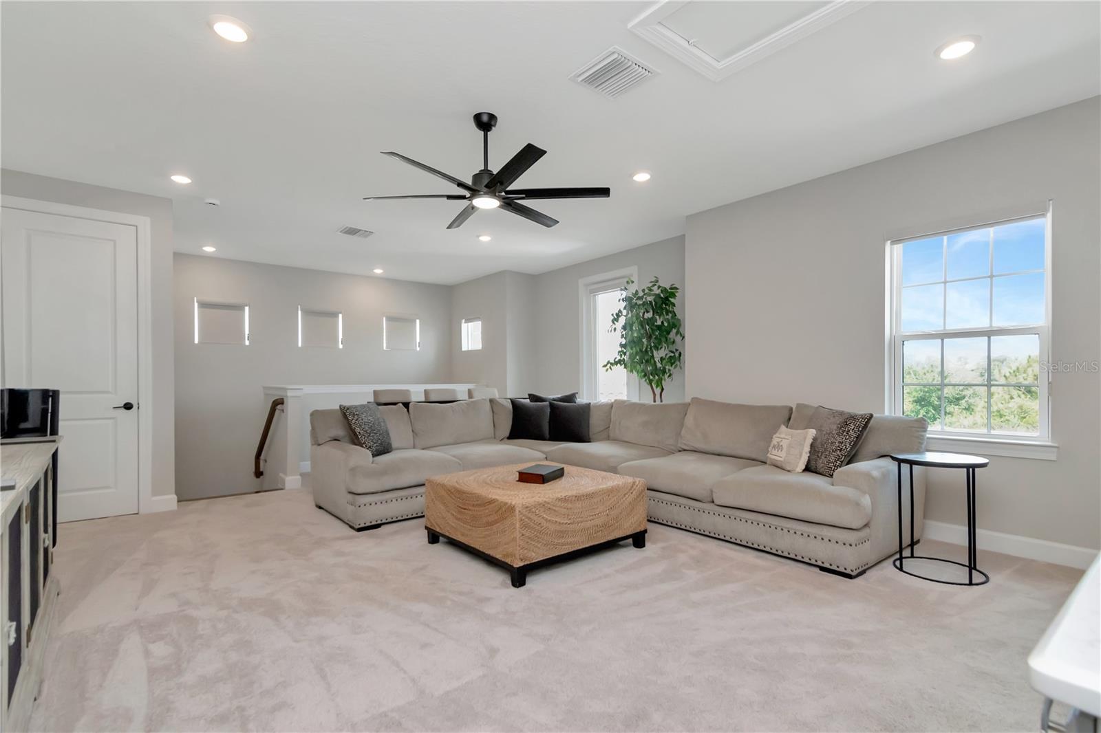 Perfect for Entertaining! Upstairs Bonus Space with Wet Bar, two Storage closets and a full Bath