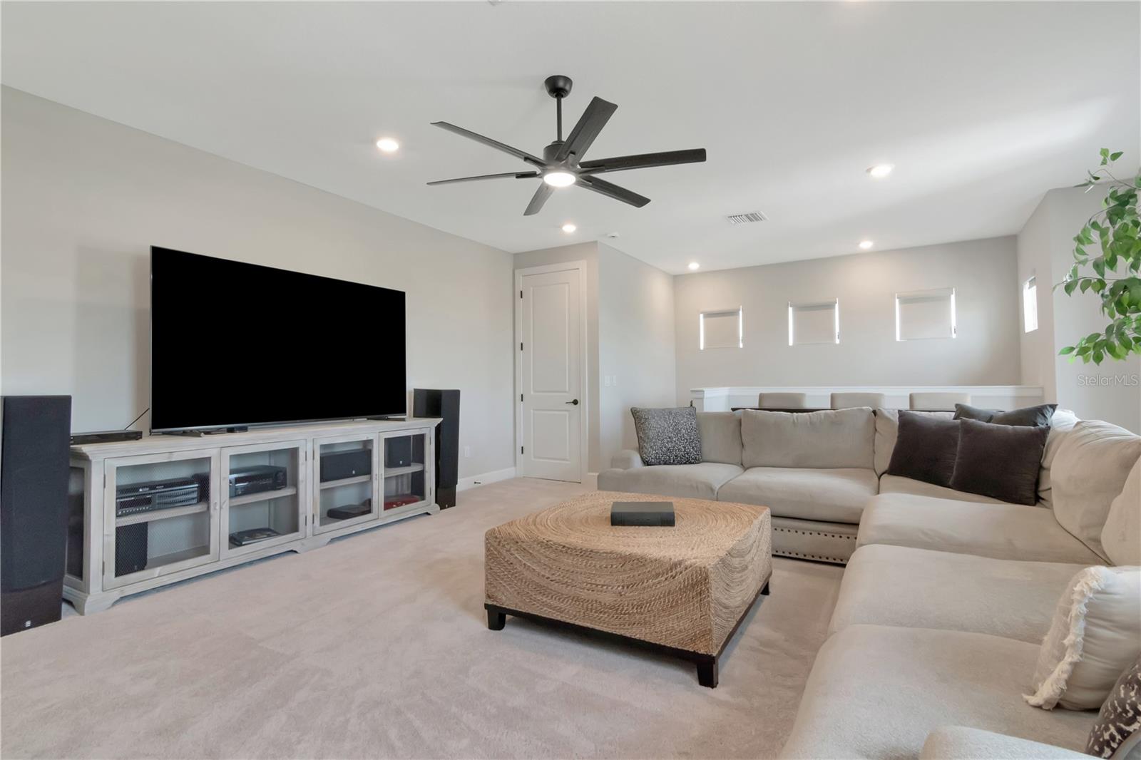 Upstairs Bonus Space with Wet Bar, two Storage closets and a full Bath