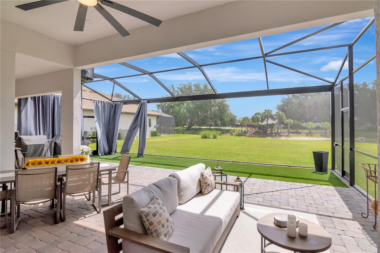Extended Lanai - Complete with panoramic screen, artificial turf, ceiling fan.
