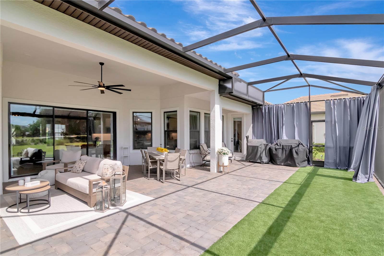 Extended Lanai - Complete with panoramic screen, artificial turf, ceiling fan.