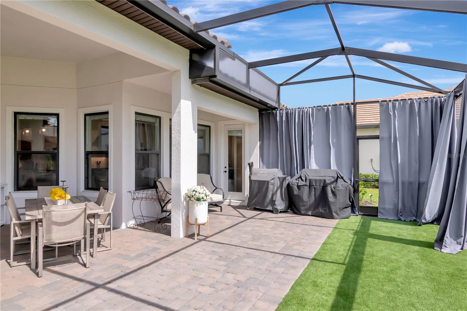 Extended Lanai - Complete with panoramic screen, artificial turf, ceiling fan.