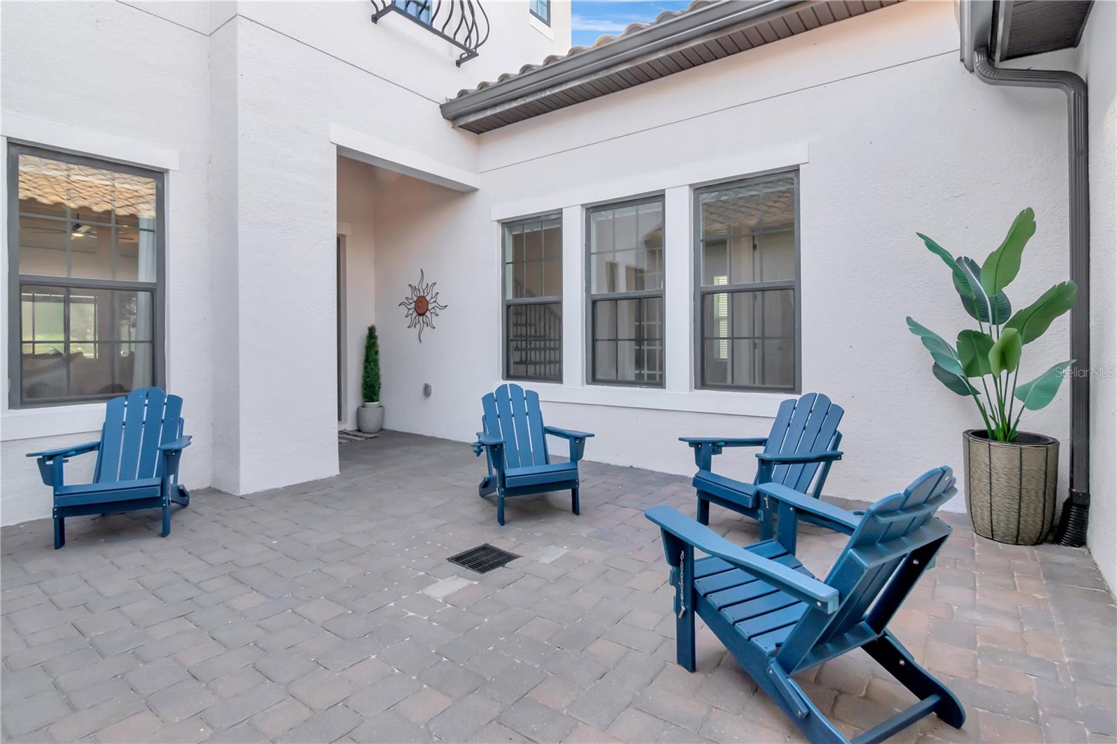 Unique and elegant courtyard entry. Offers additional security and privacy but also great for entertaining.