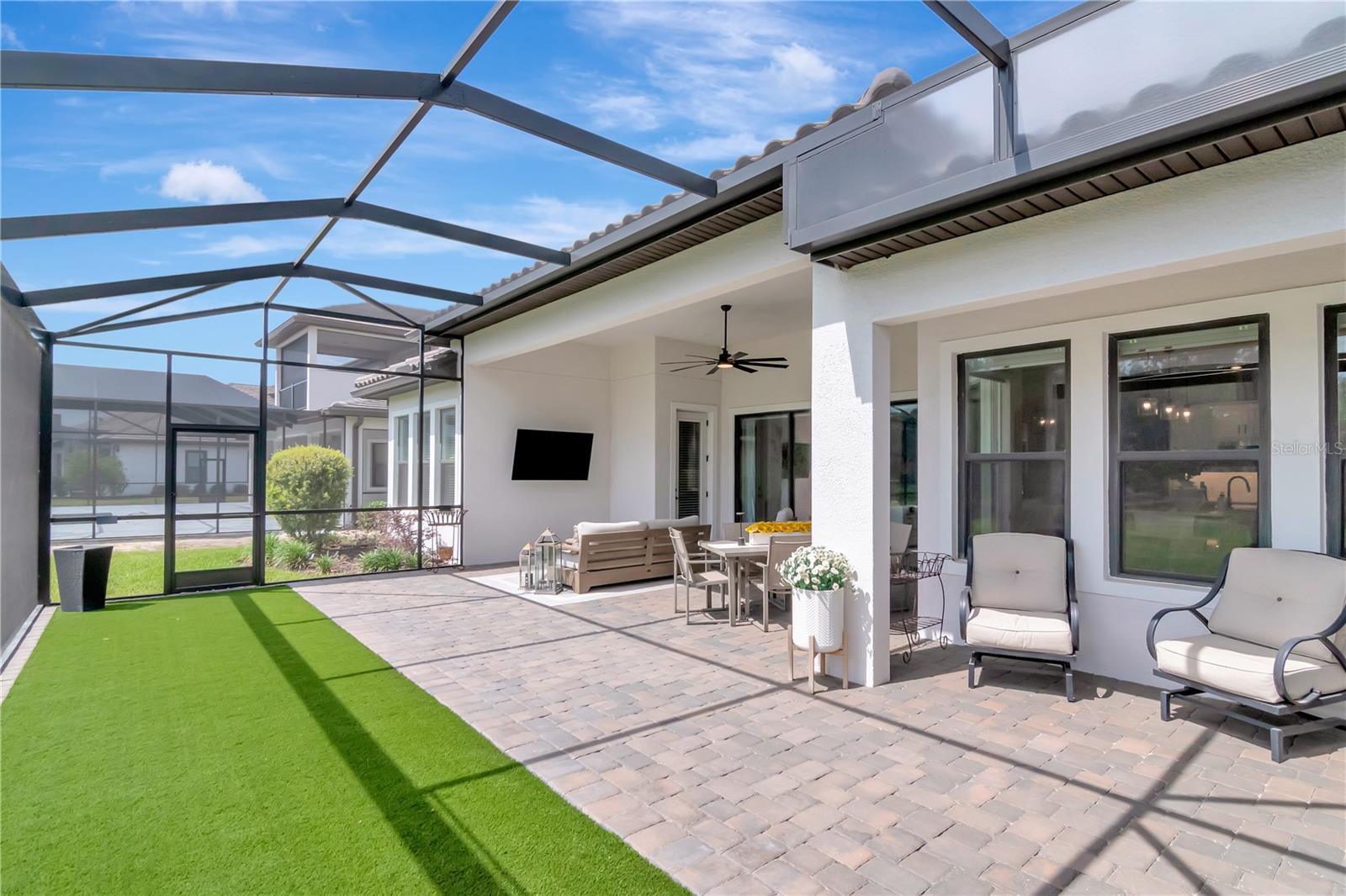 Extended Lanai - Complete with panoramic screen, artificial turf, ceiling fan.