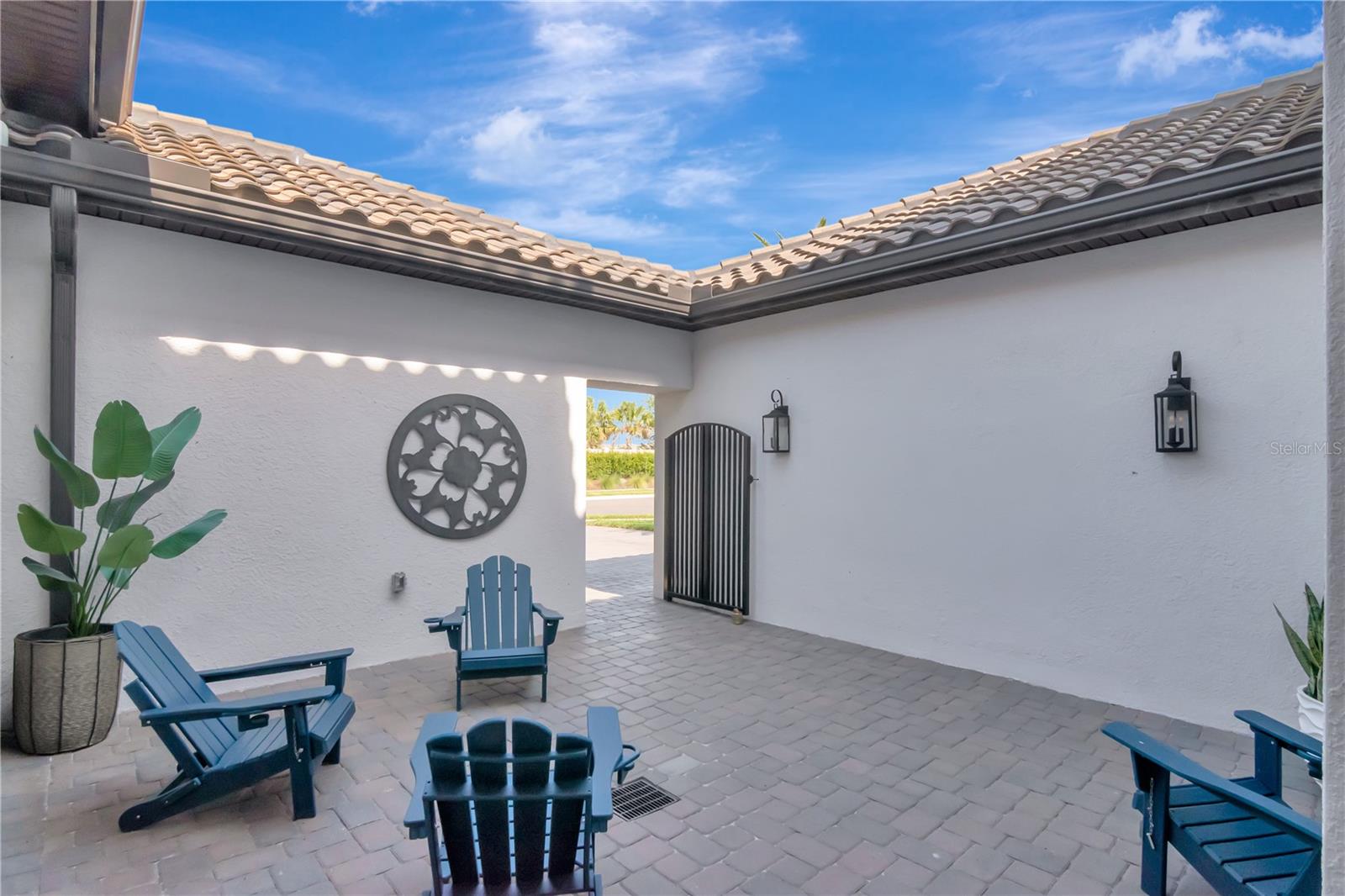 Unique and elegant courtyard entry. Offers additional security and privacy but also great for entertaining.