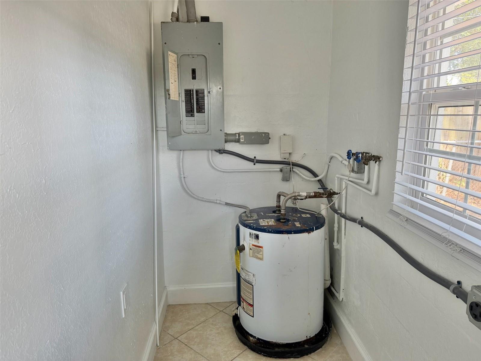 Laundry Room w/ water heater
