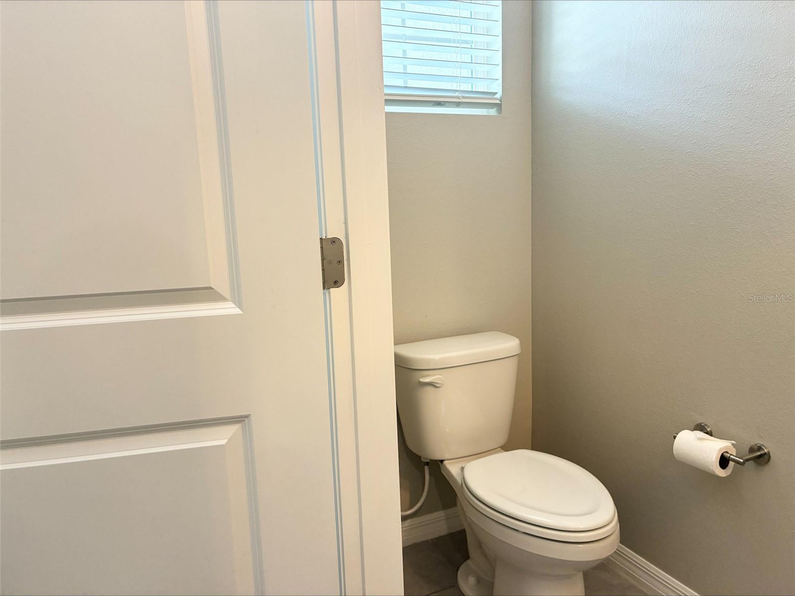 Down Stairs Foyer Half Bath