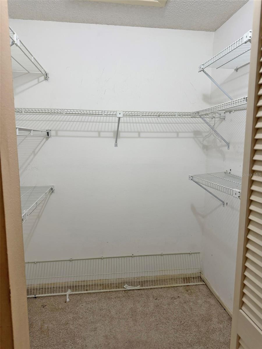 Primary Bedroom Walk In Closet