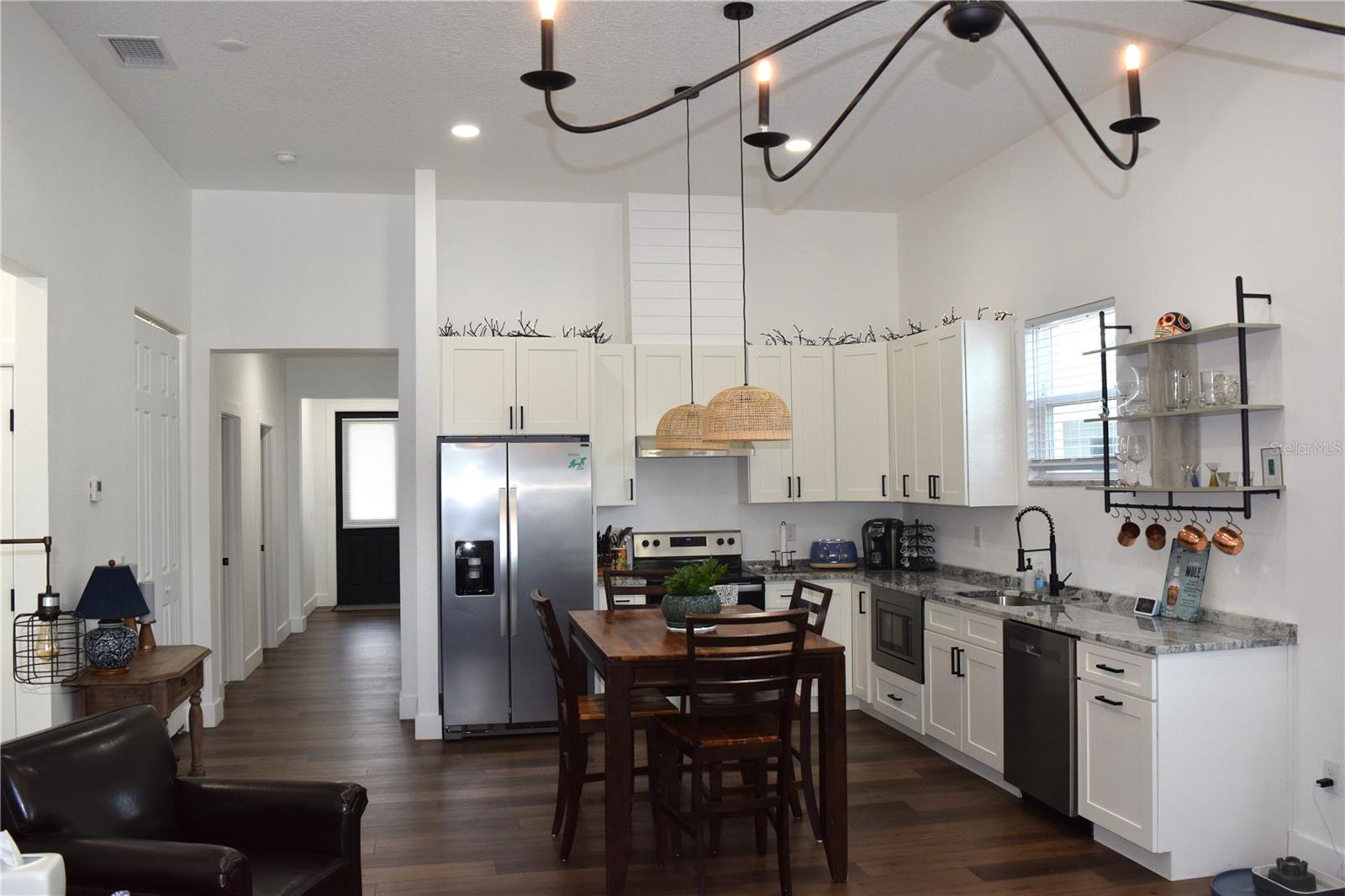 Kitchen features Stainless Appliances, Granite Counters and a Closet Pantry