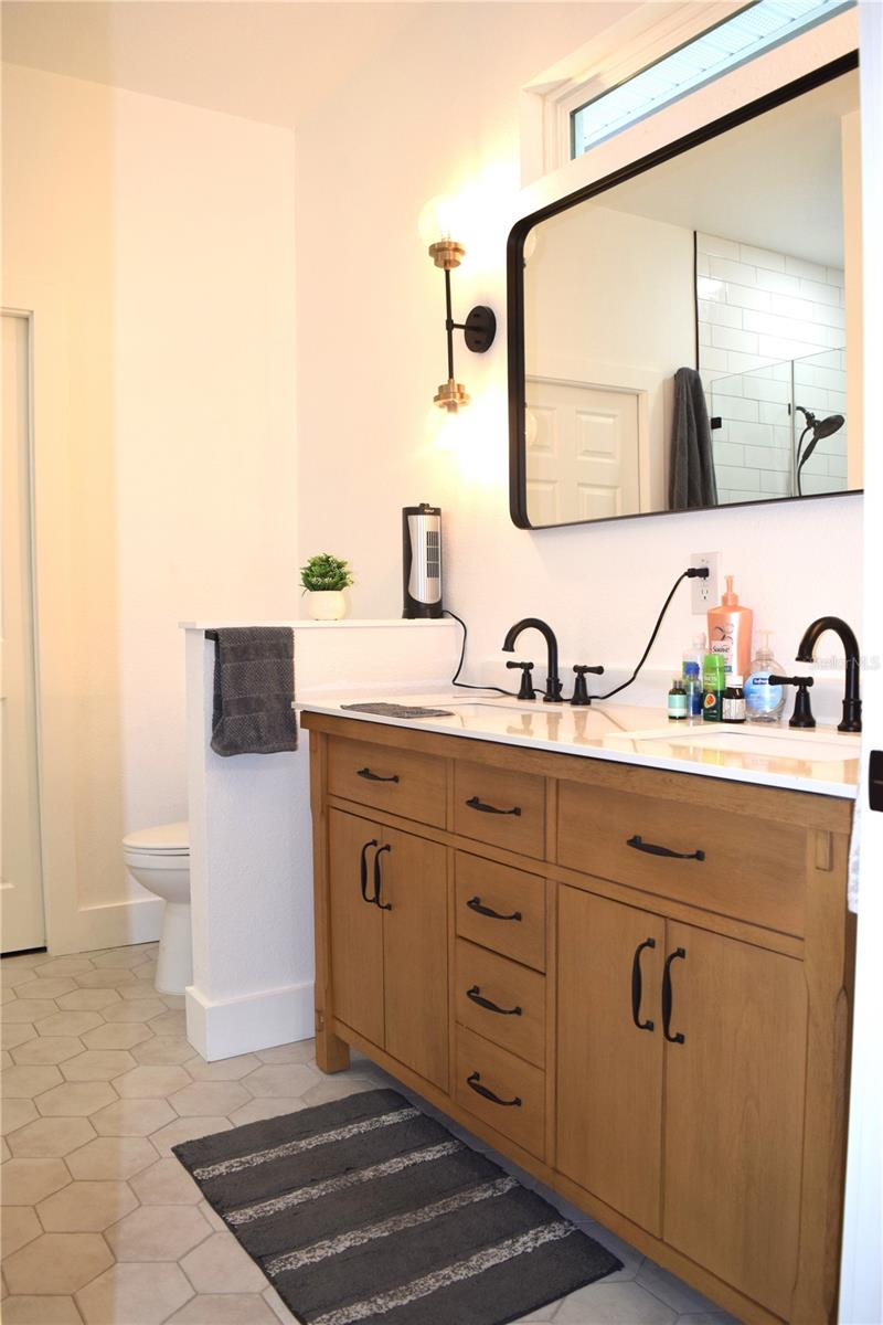 Primary Bathroom with Dual Sinks and a Walk-In Shower