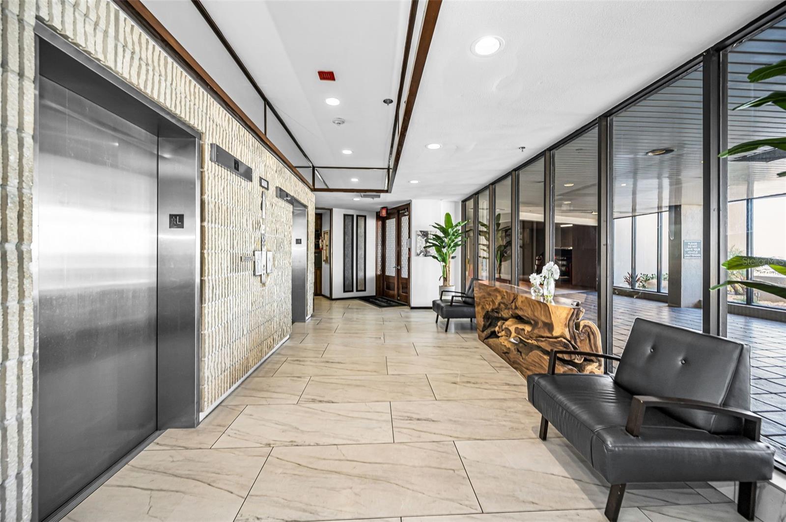 Double Elevators in the Lobby taking you to your residence!