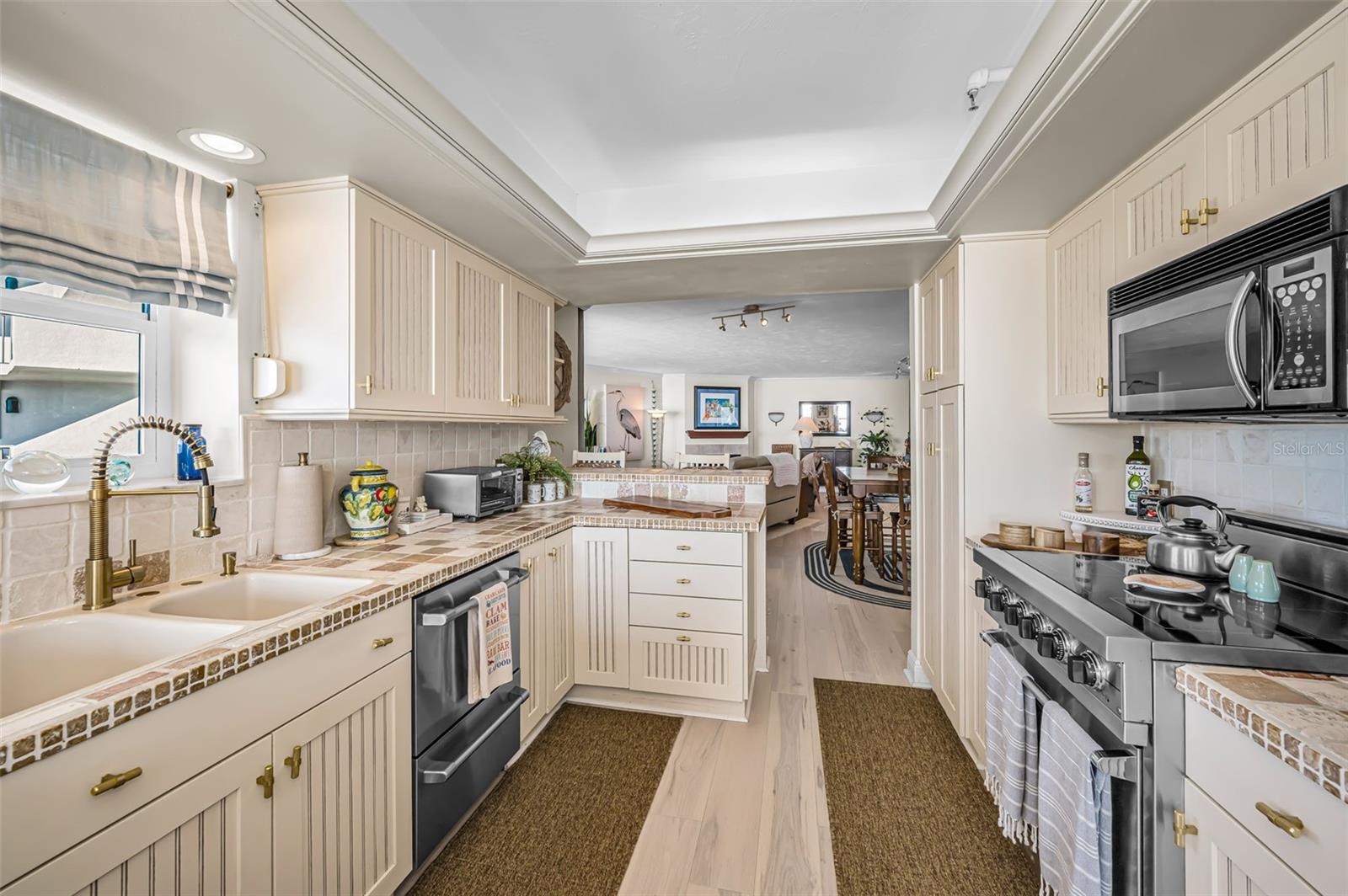 Beautiful shaker cabinets and Coastal Contemporary finishes