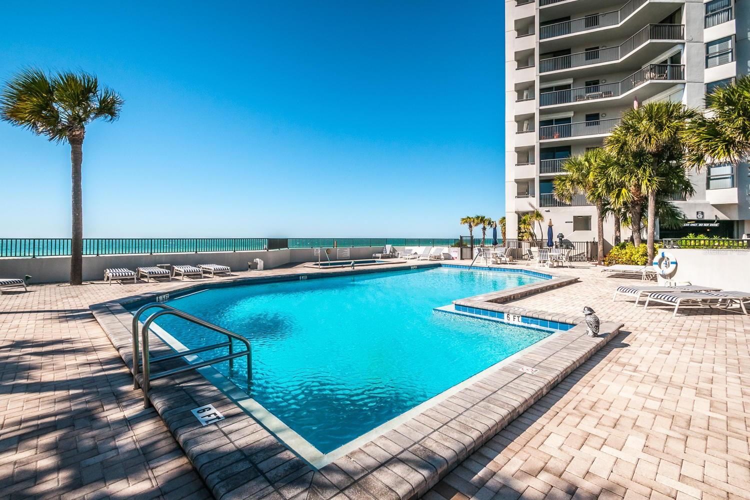 Gulf front Sunsets daily from your private inground, heated pool!