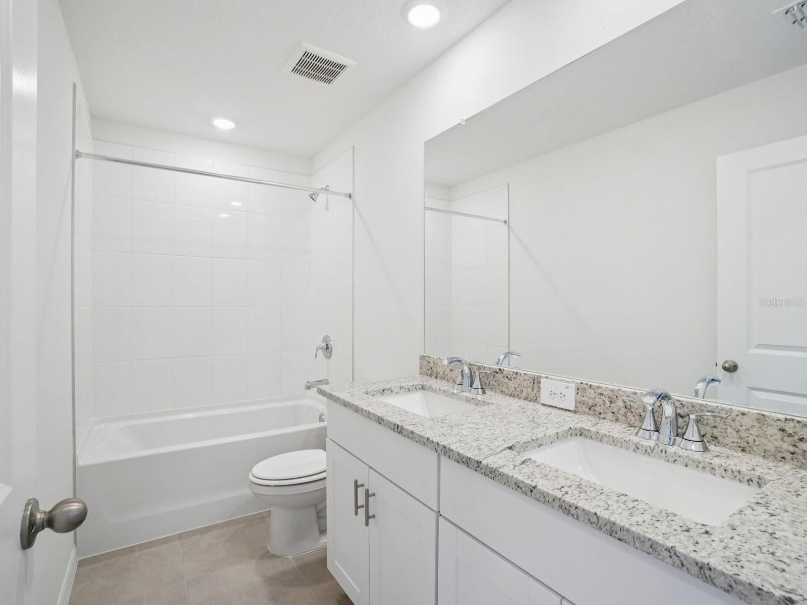 Interior photos are not of the actual home but are photos of the builder home with the same floorplan with similar interior finishes and features.