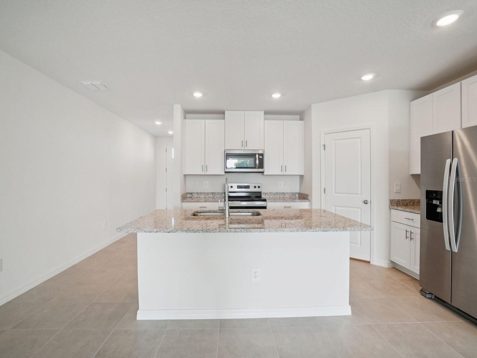 Interior photos are not of the actual home but are photos of the builder home with the same floorplan with similar interior finishes and features.