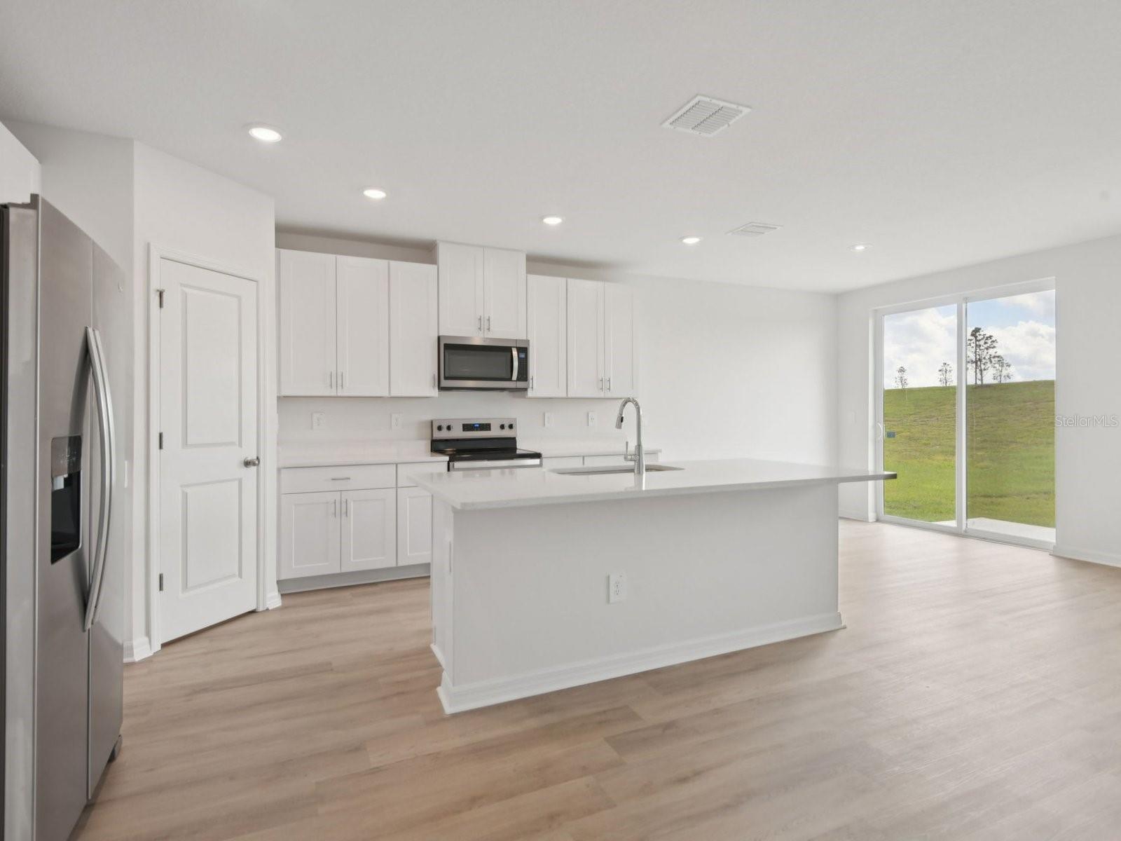 Interior photos are not of the actual home but are photos of the builder home with the same floorplan with similar interior finishes and features.
