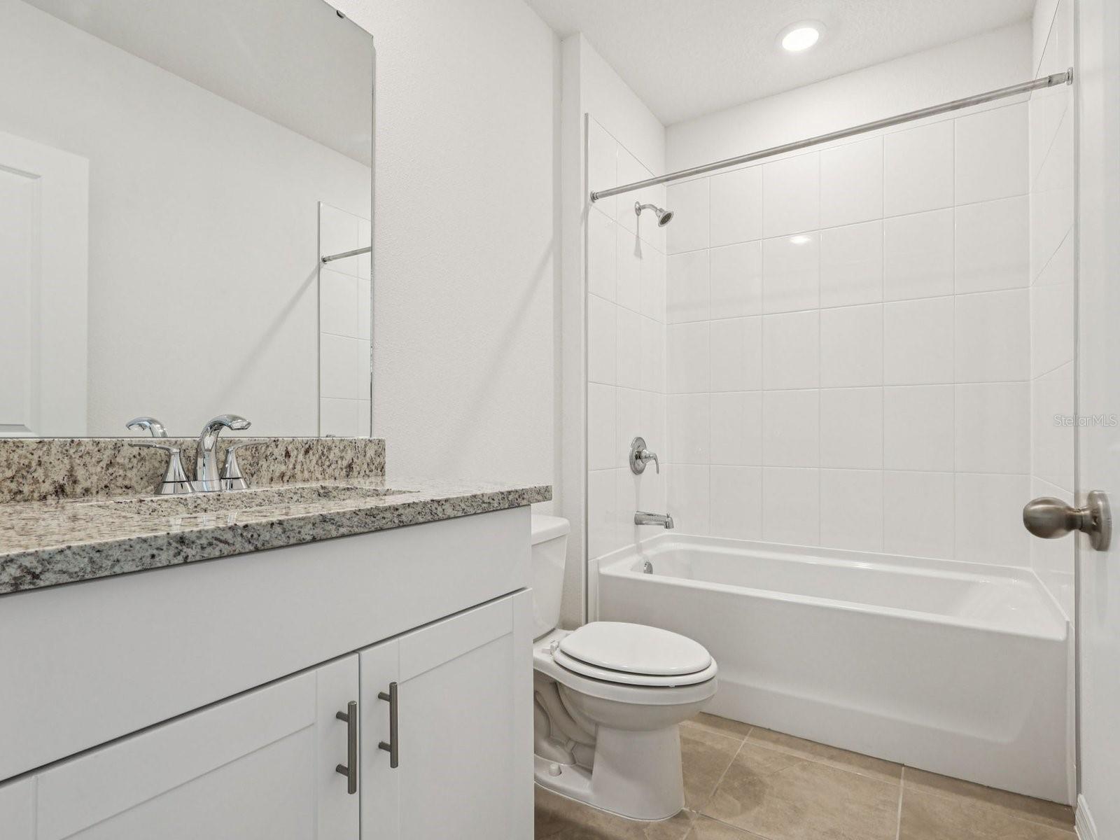Interior photos are not of the actual home but are photos of the builder home with the same floorplan with similar interior finishes and features.