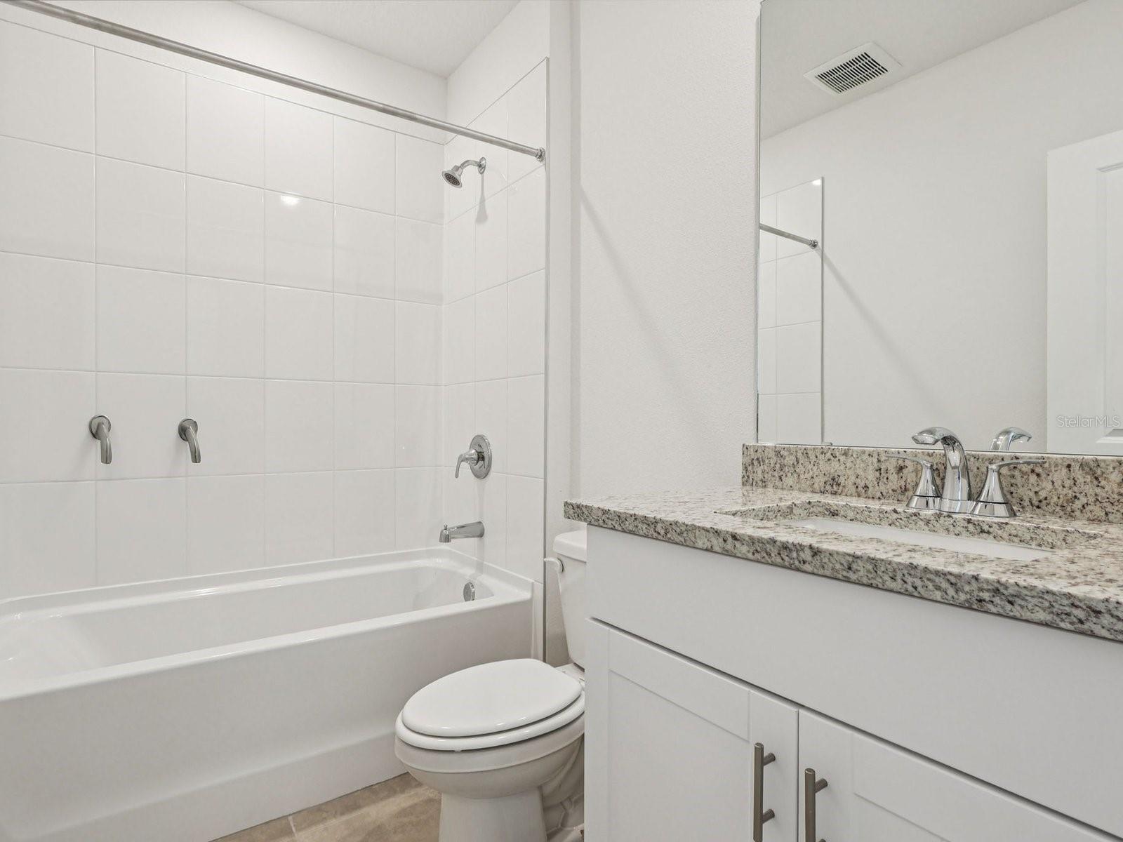 Interior photos are not of the actual home but are photos of the builder home with the same floorplan with similar interior finishes and features.