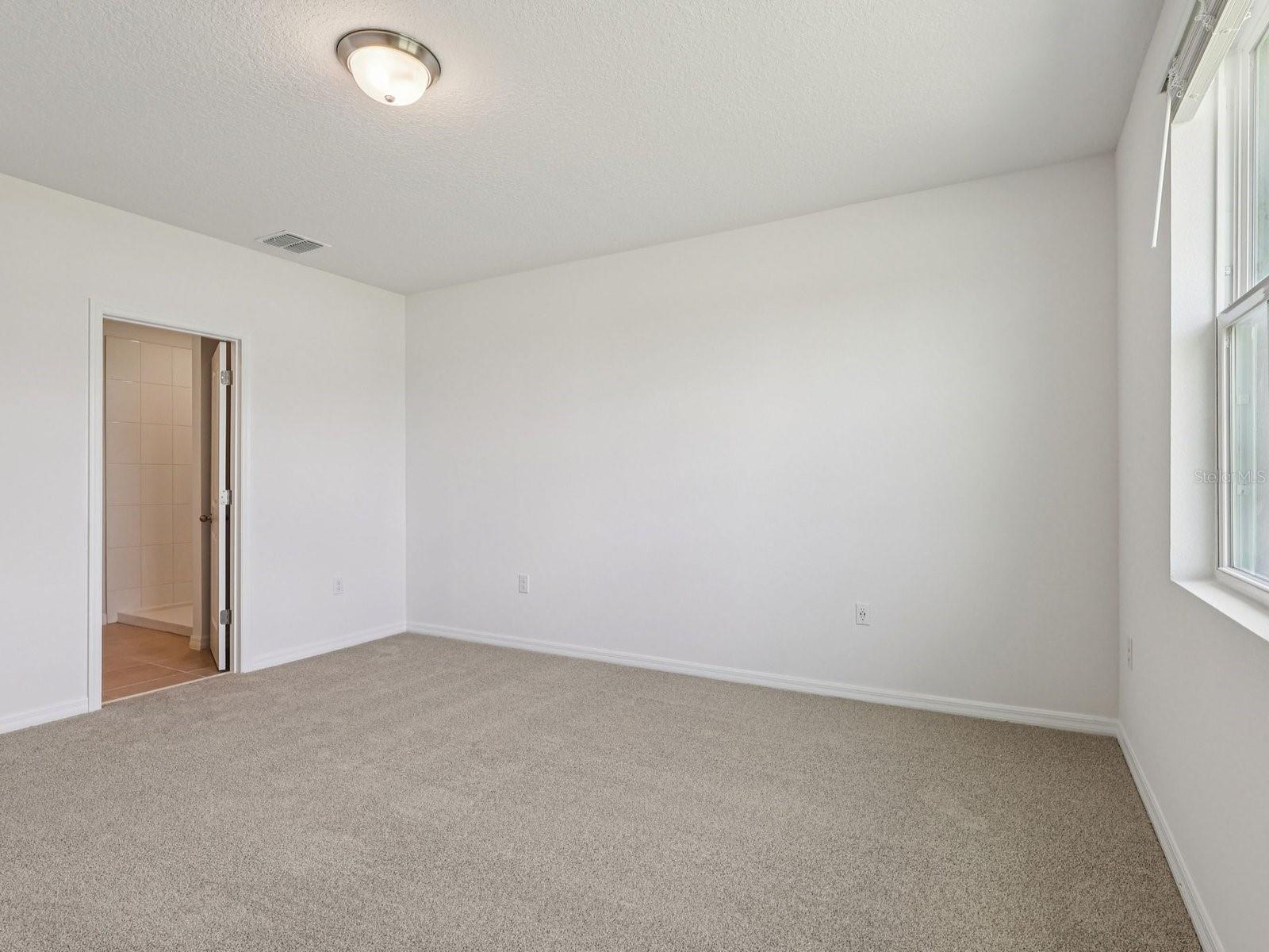 Interior photos are not of the actual home but are photos of the builder home with the same floorplan with similar interior finishes and features.