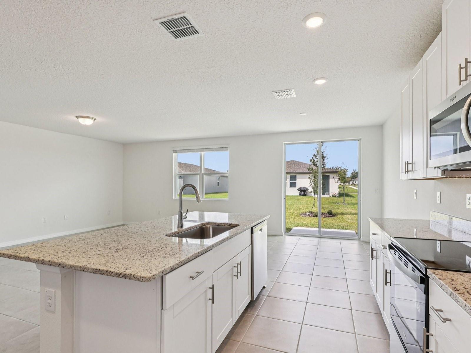 Interior photos are not of the actual home but are photos of the builder home with the same floorplan with similar interior finishes and features.