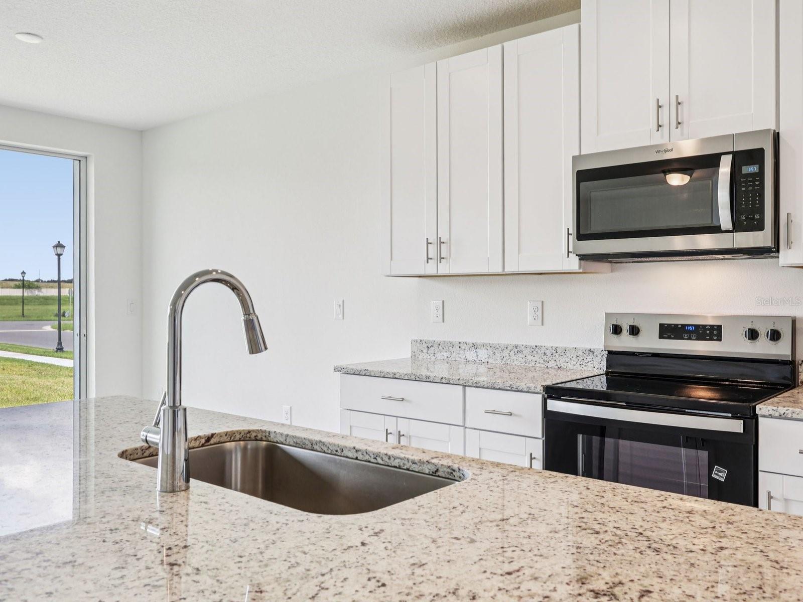 Interior photos are not of the actual home but are photos of the builder home with the same floorplan with similar interior finishes and features.