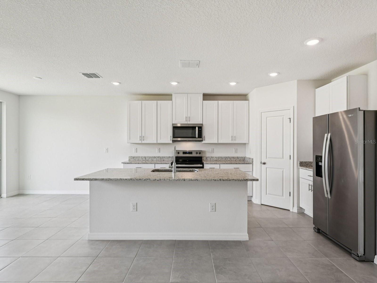Interior photos are not of the actual home but are photos of the builder home with the same floorplan with similar interior finishes and features.