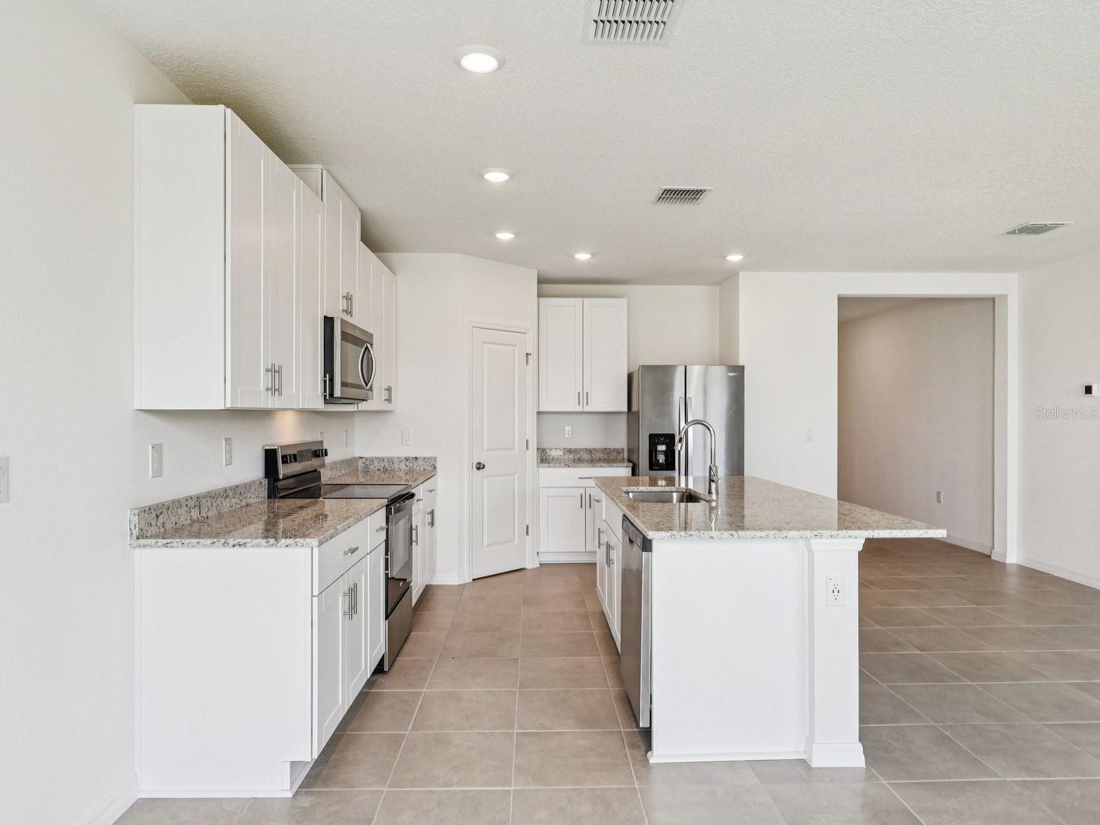 Interior photos are not of the actual home but are photos of the builder home with the same floorplan with similar interior finishes and features.