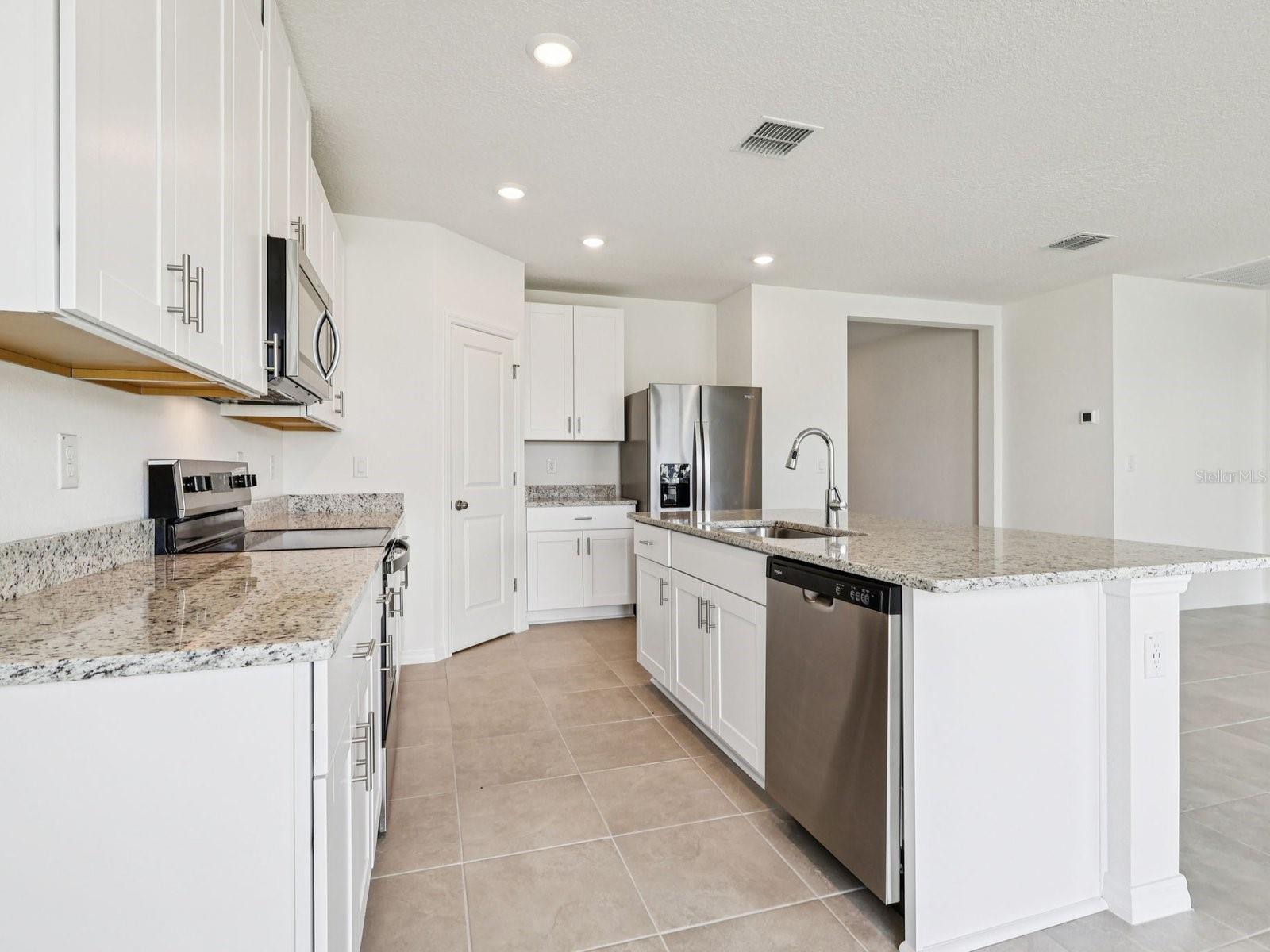 Interior photos are not of the actual home but are photos of the builder home with the same floorplan with similar interior finishes and features.