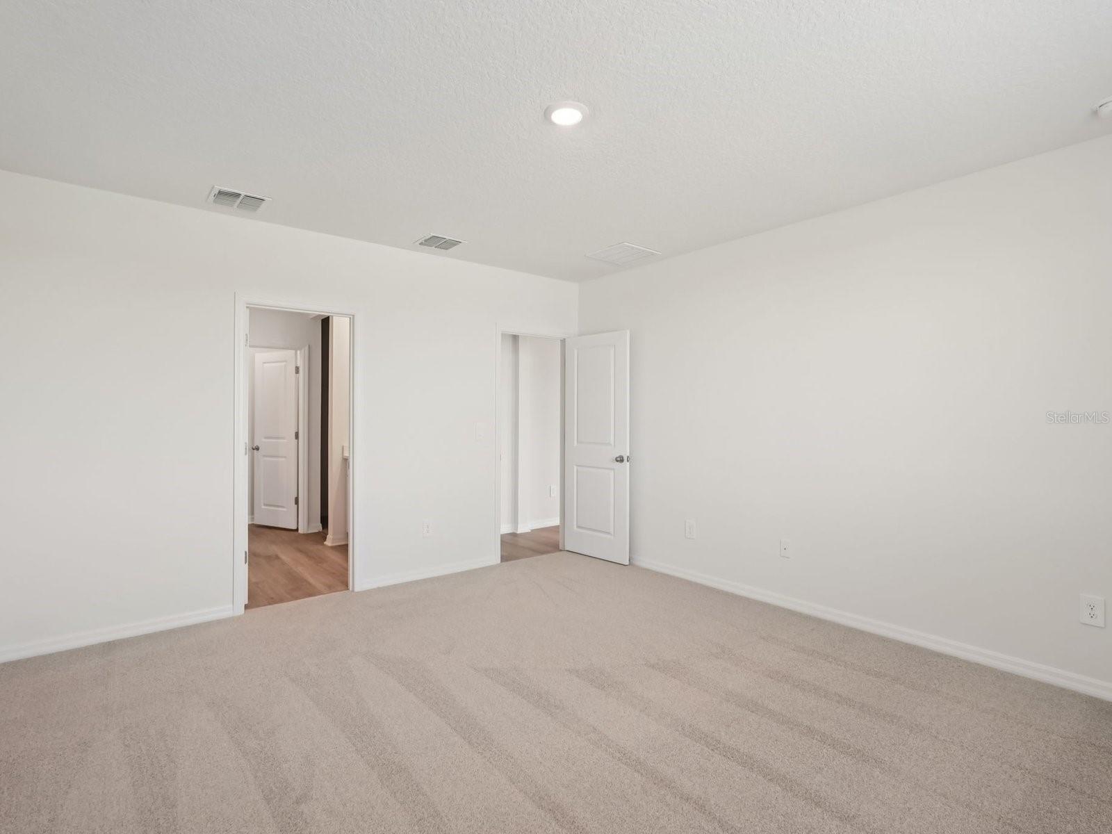 Interior photos are not of the actual home but are photos of the builder home with the same floorplan with similar interior finishes and features.