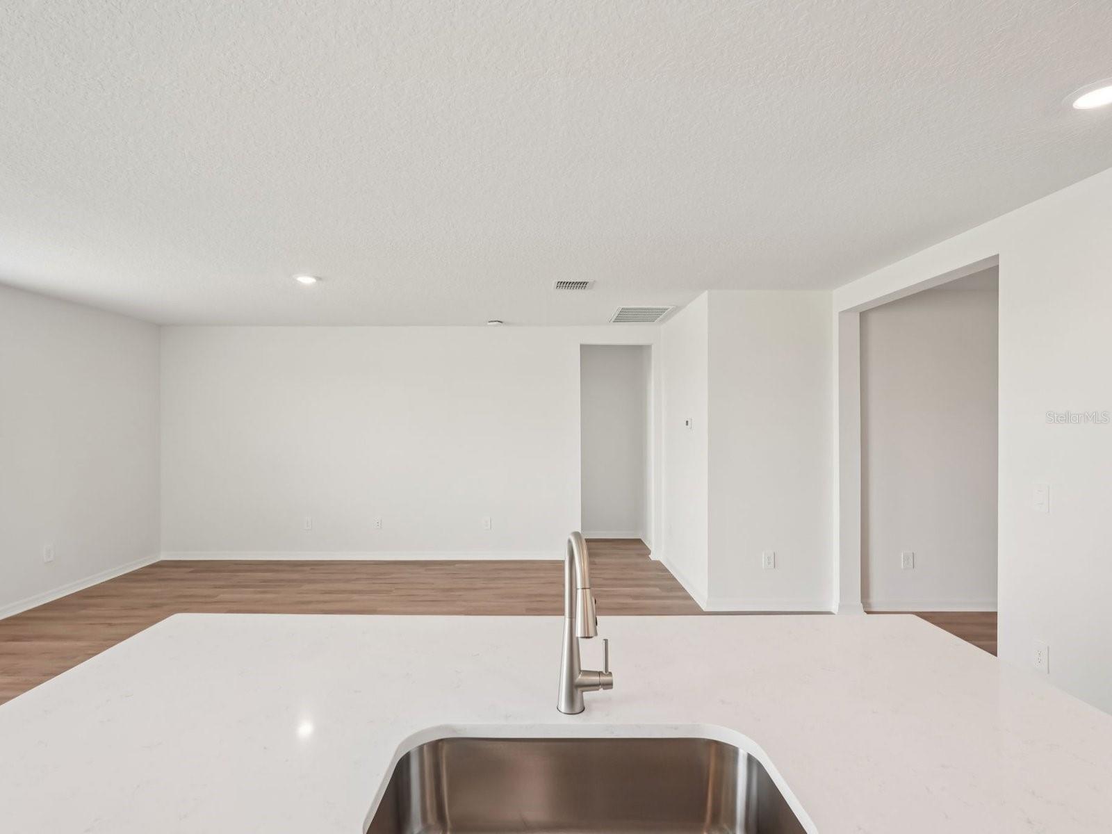 Interior photos are not of the actual home but are photos of the builder home with the same floorplan with similar interior finishes and features.
