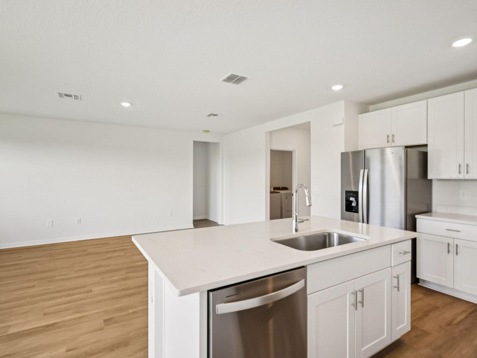 Interior photos are not of the actual home but are photos of the builder home with the same floorplan with similar interior finishes and features.