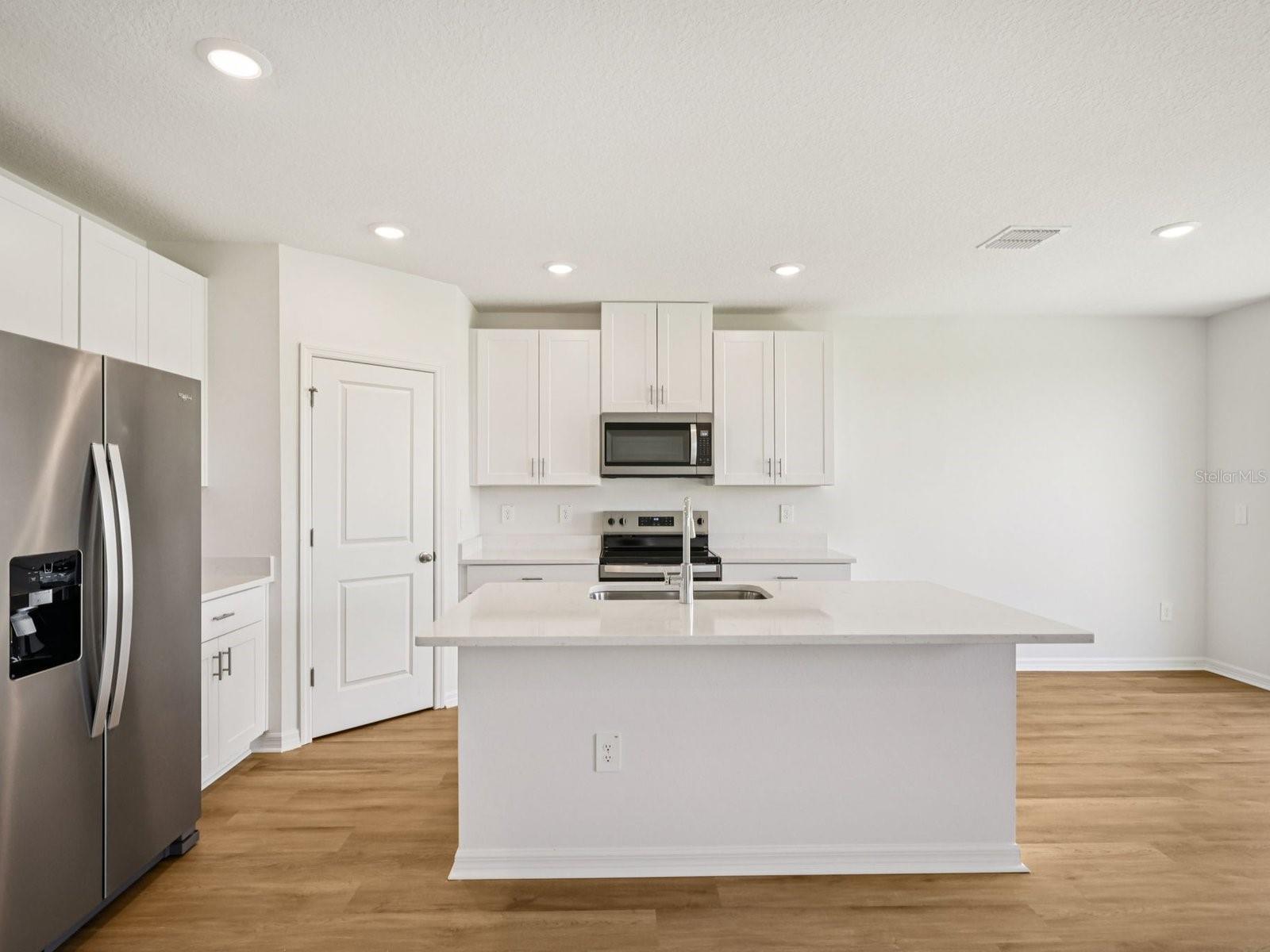 Interior photos are not of the actual home but are photos of the builder home with the same floorplan with similar interior finishes and features.