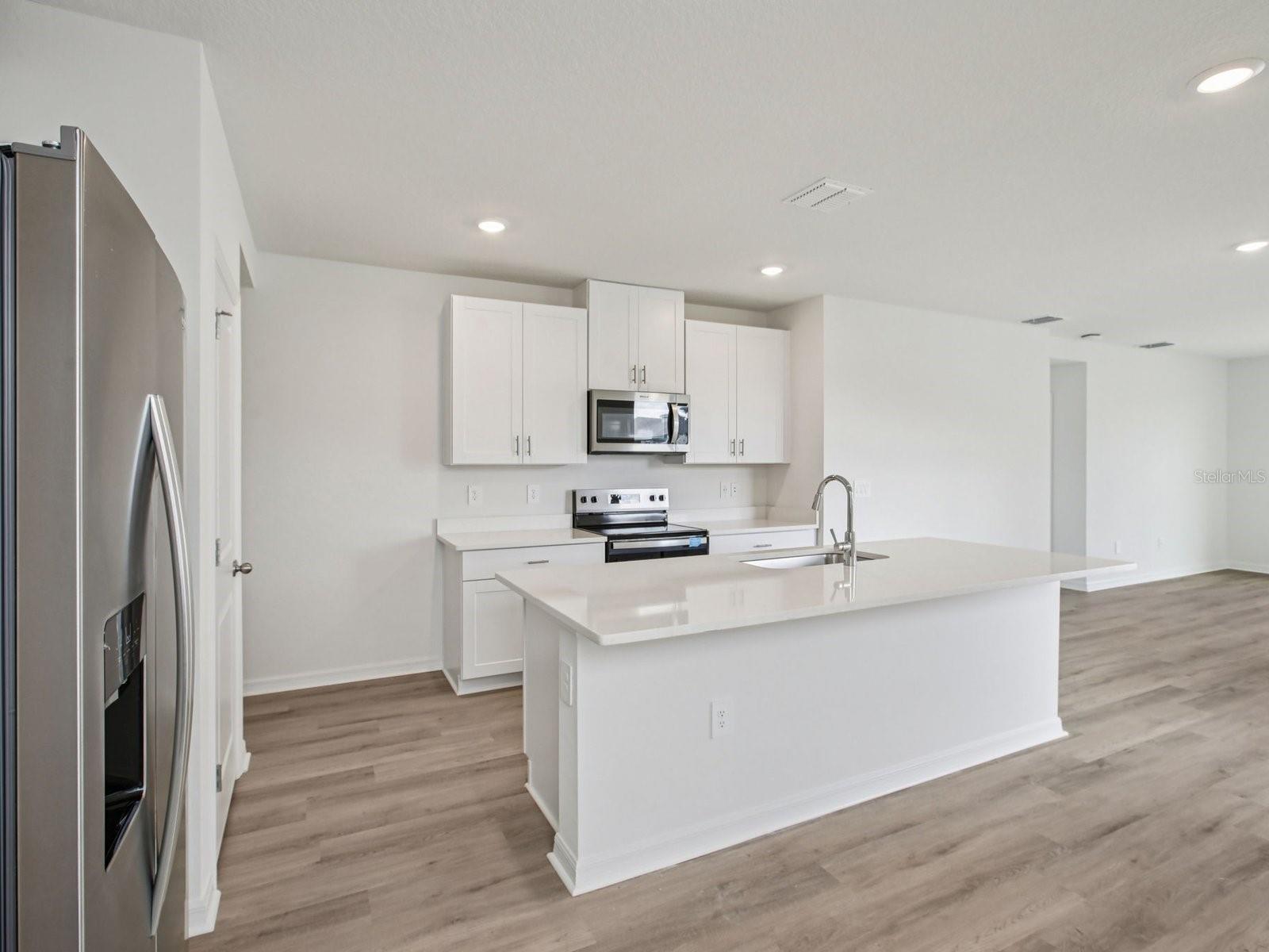 Interior photos are not of the actual home but are photos of the builder home with the same floorplan with similar interior finishes and features.