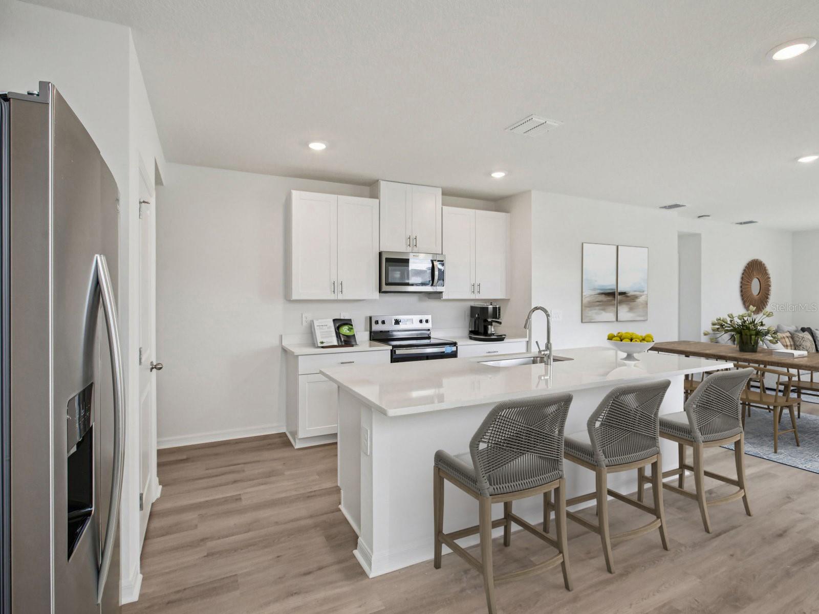 Interior photos are not of the actual home but are photos of the builder home with same floorplan with similar interior finishes and features. Photo uses virtual staging.