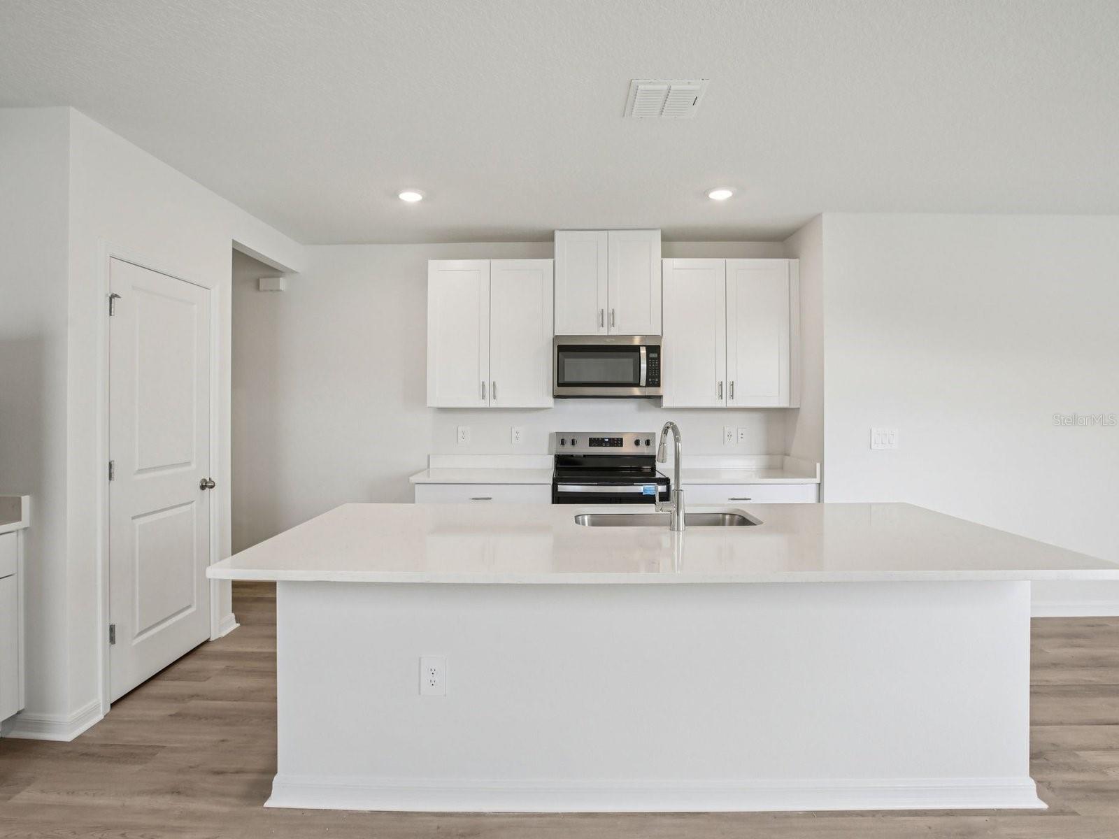 Interior photos are not of the actual home but are photos of the builder home with the same floorplan with similar interior finishes and features.