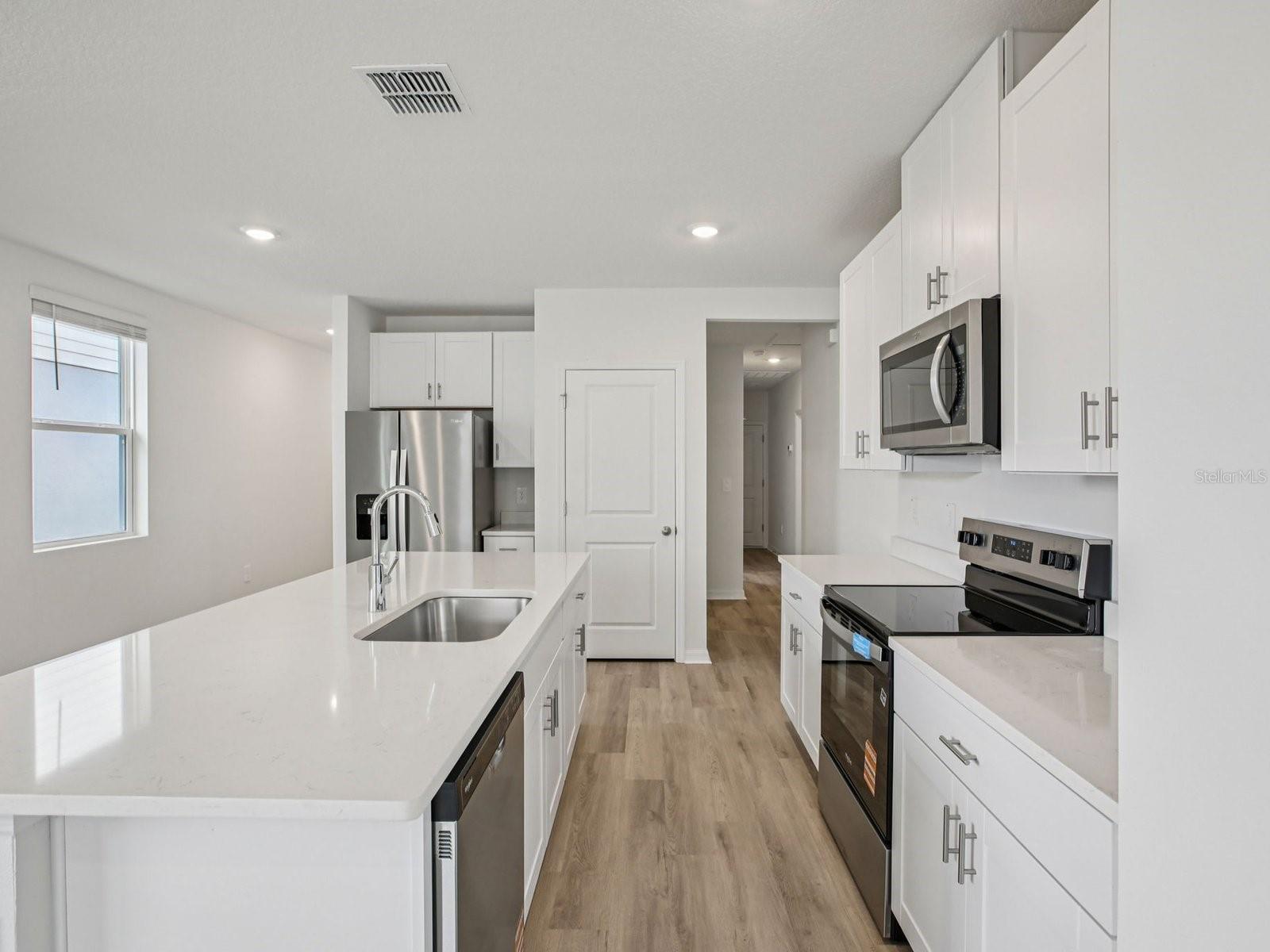 Interior photos are not of the actual home but are photos of the builder home with the same floorplan with similar interior finishes and features.