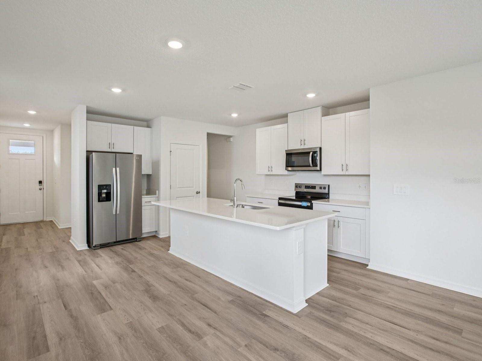 Interior photos are not of the actual home but are photos of the builder home with the same floorplan with similar interior finishes and features.