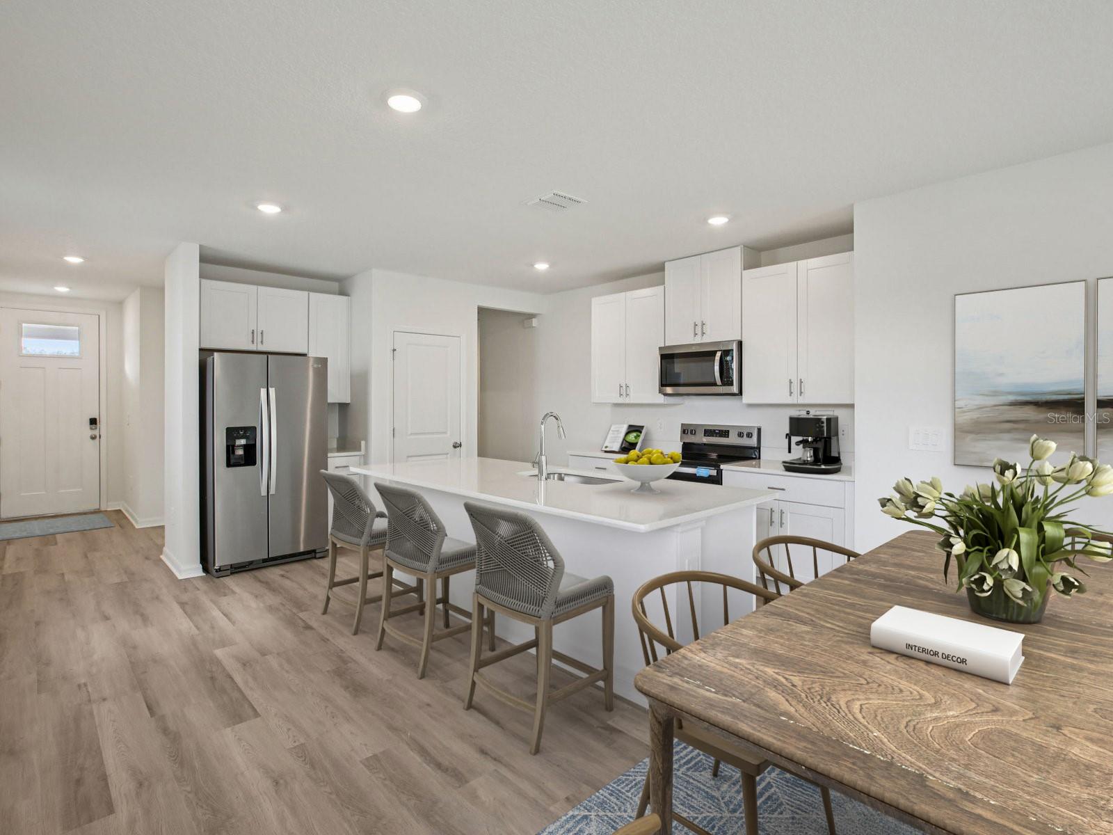 Interior photos are not of the actual home but are photos of the builder home with same floorplan with similar interior finishes and features. Photo uses virtual staging.