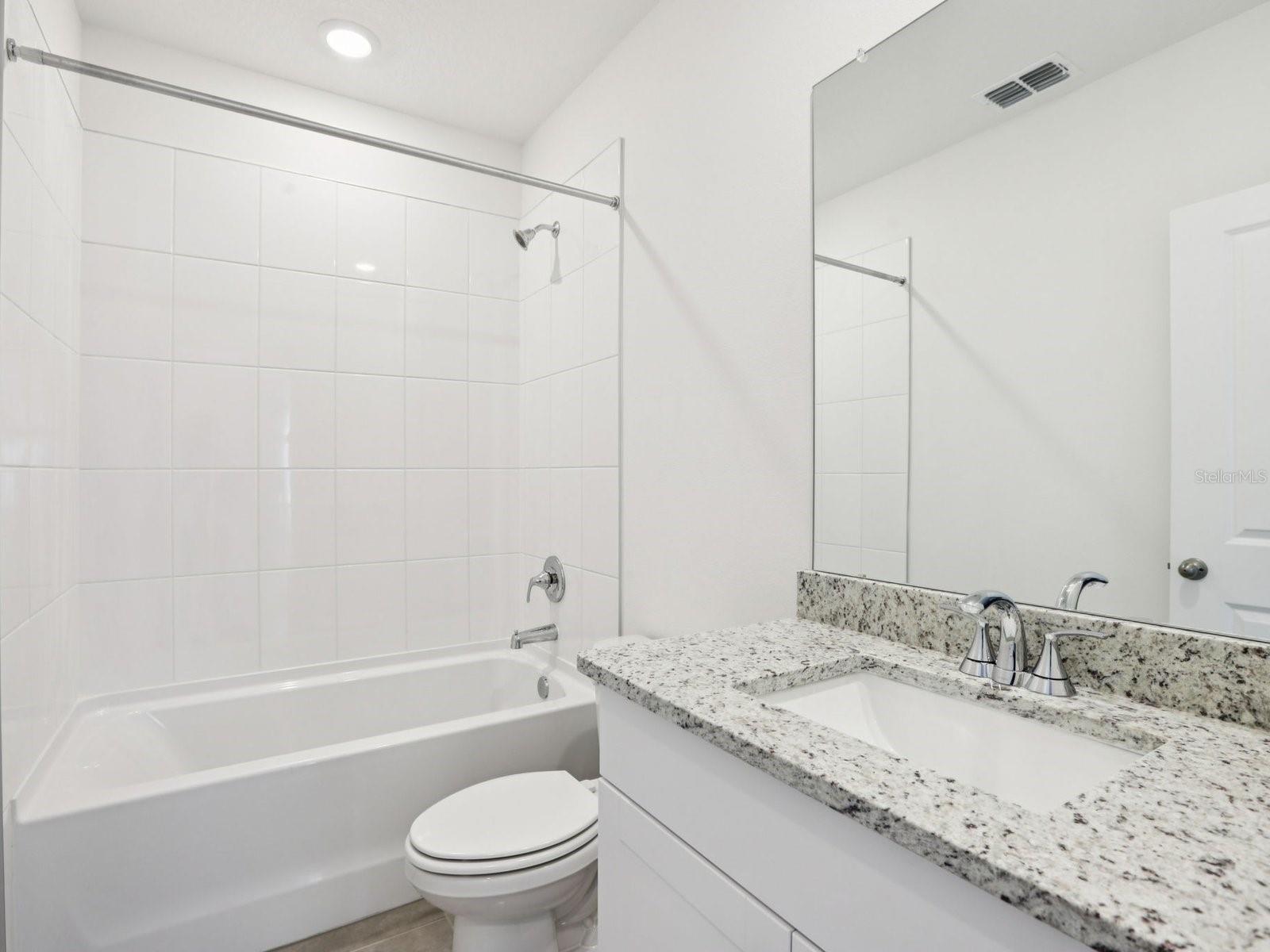 Interior photos are not of the actual home but are photos of the builder home with the same floorplan with similar interior finishes and features.