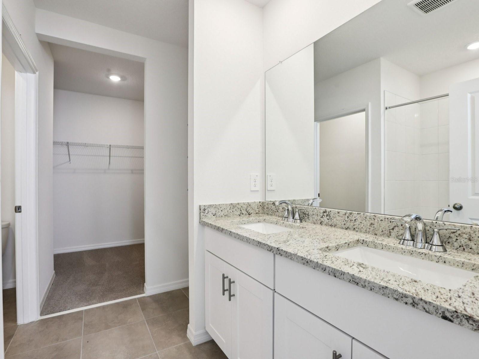 Interior photos are not of the actual home but are photos of the builder home with the same floorplan with similar interior finishes and features.
