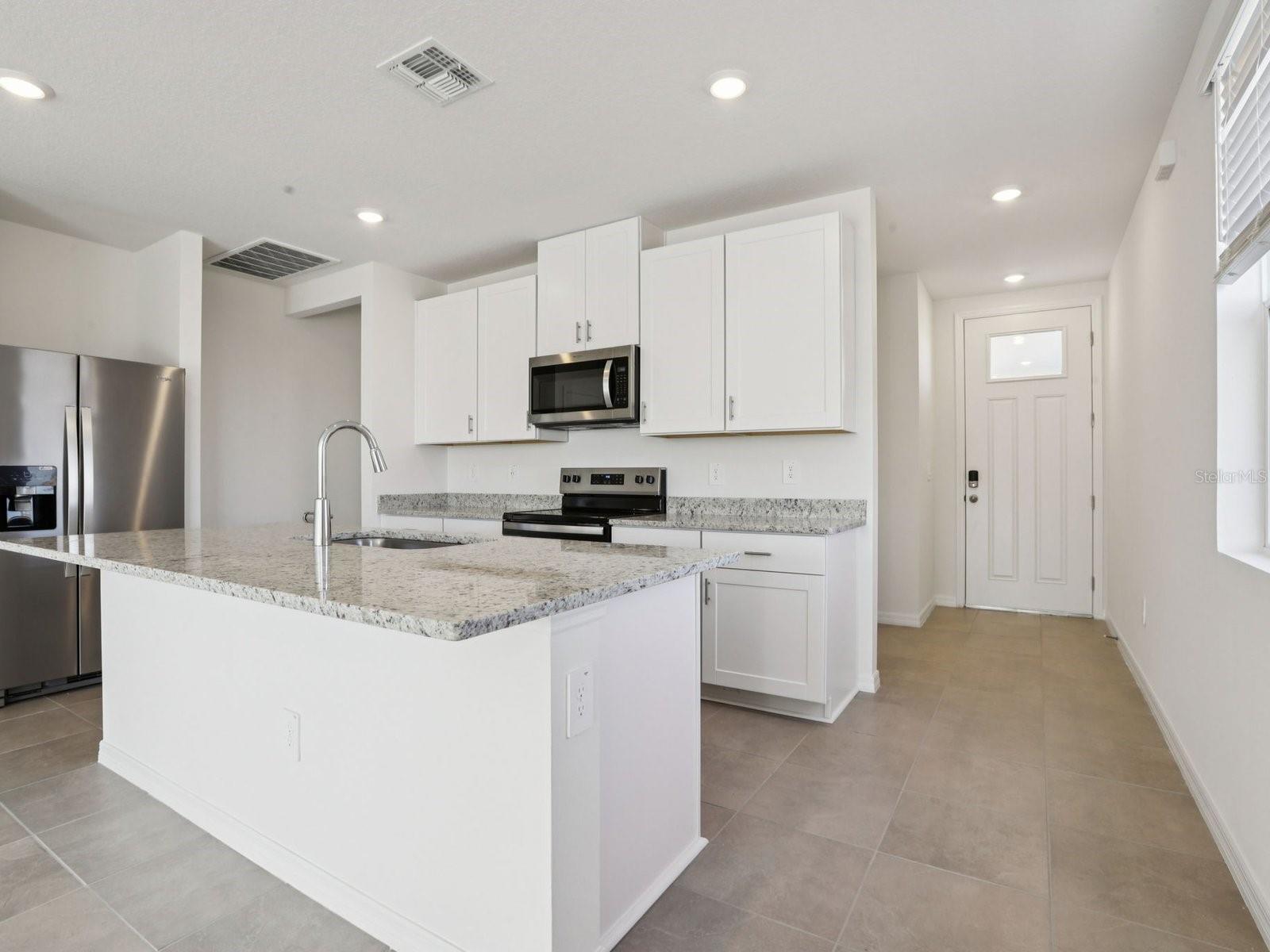 Interior photos are not of the actual home but are photos of the builder home with the same floorplan with similar interior finishes and features.