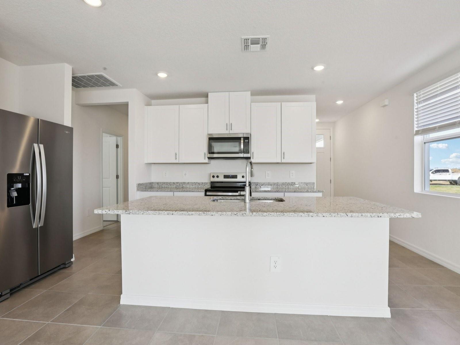 Interior photos are not of the actual home but are photos of the builder home with the same floorplan with similar interior finishes and features.