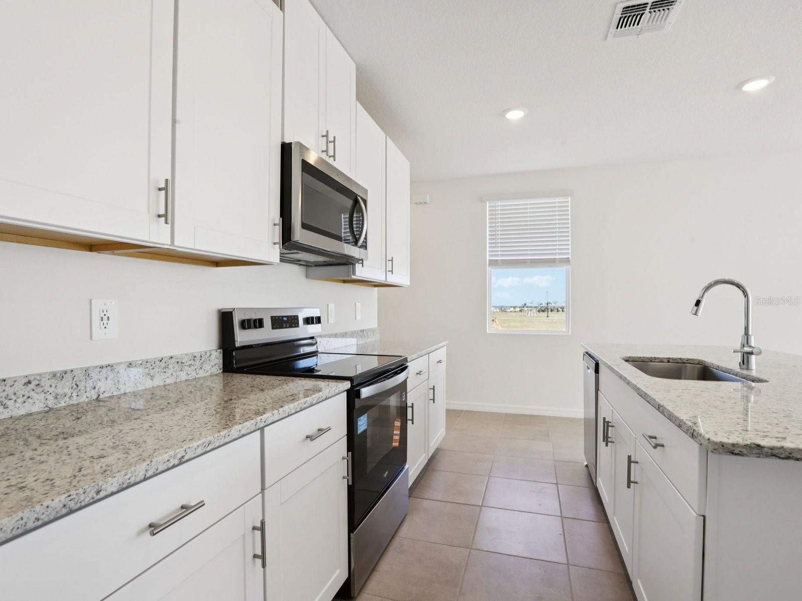 Interior photos are not of the actual home but are photos of the builder home with the same floorplan with similar interior finishes and features.