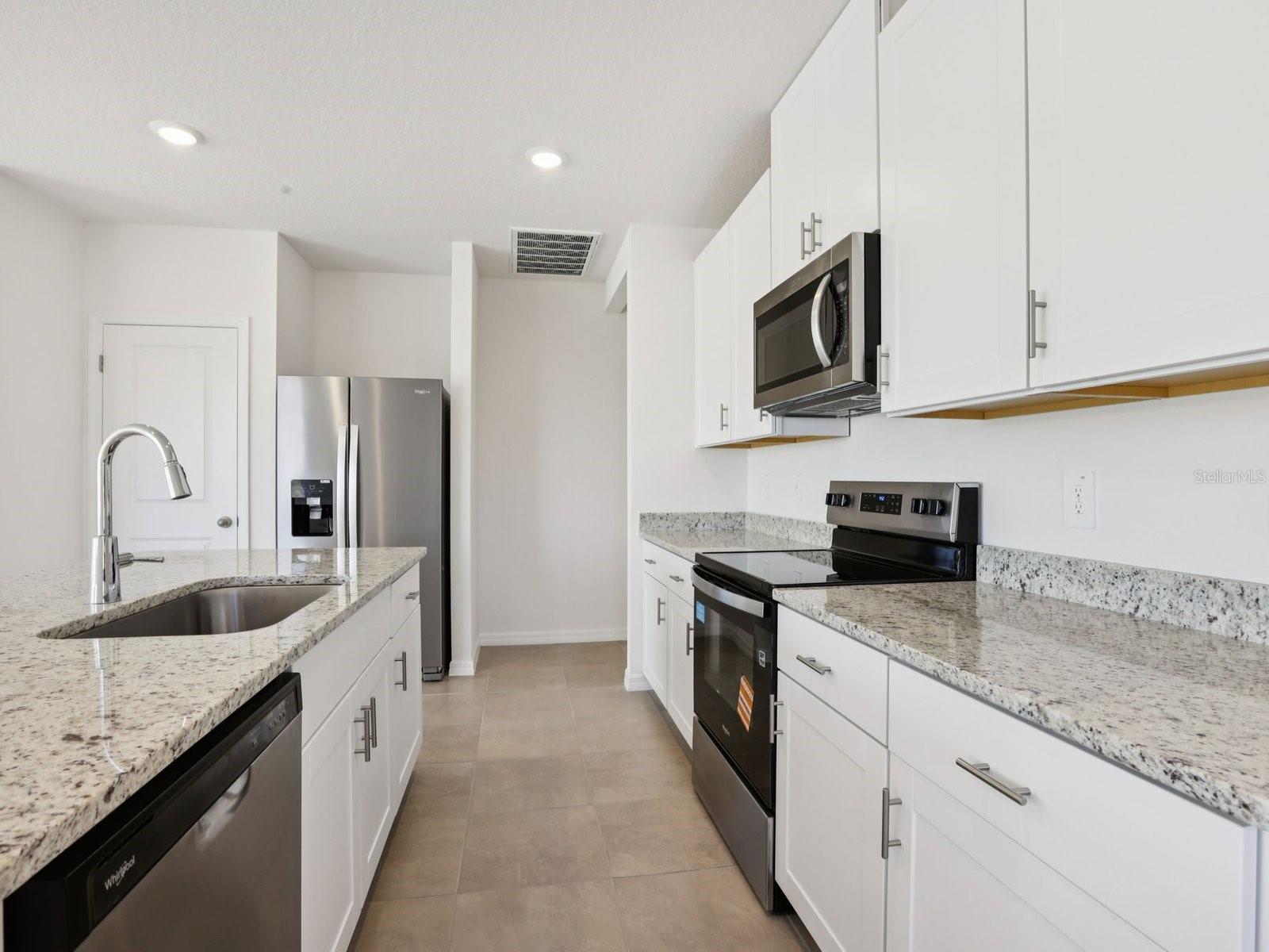 Interior photos are not of the actual home but are photos of the builder home with the same floorplan with similar interior finishes and features.