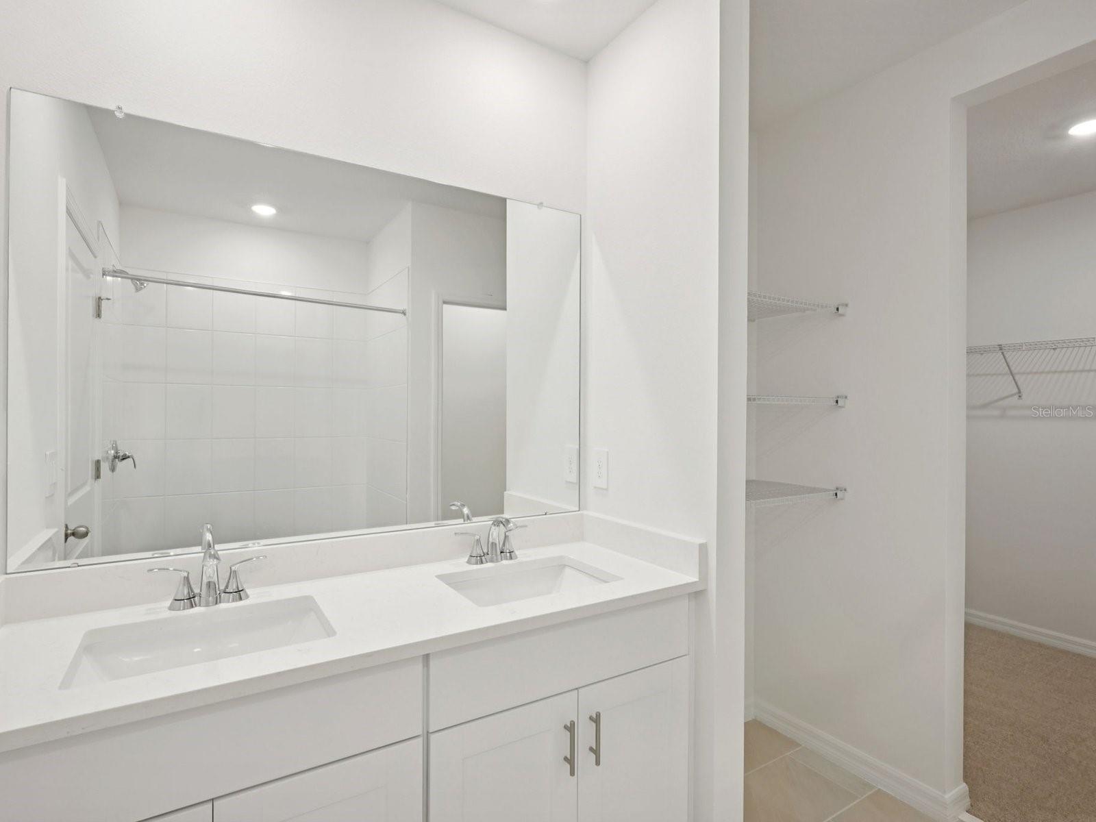 Interior photos are not of the actual home but are photos of the builder home with the same floorplan with similar interior finishes and features.