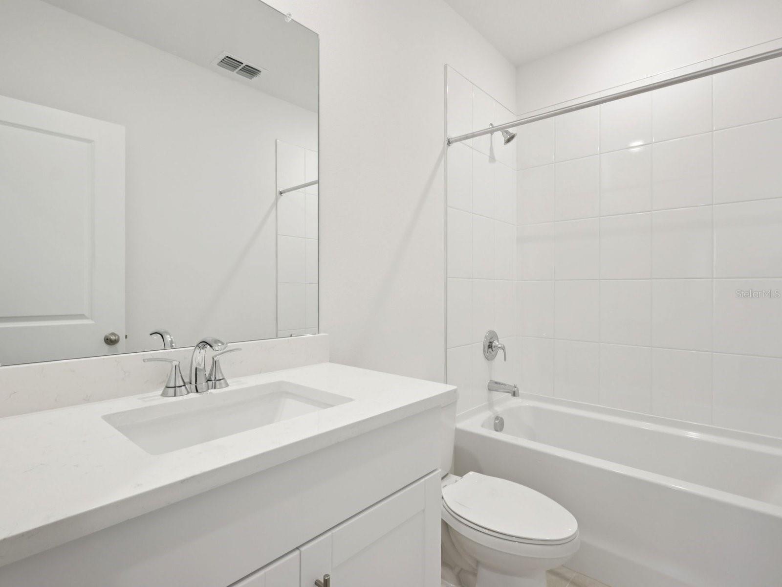 Interior photos are not of the actual home but are photos of the builder home with the same floorplan with similar interior finishes and features.