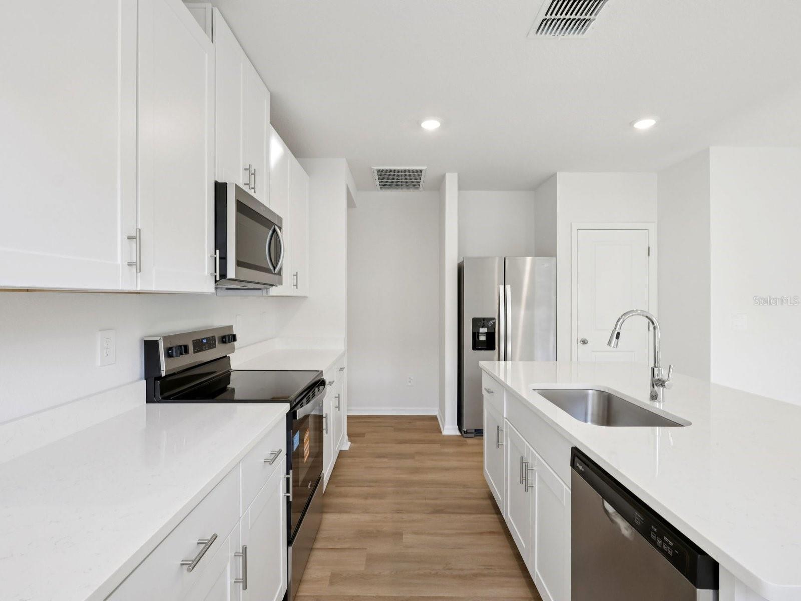 Interior photos are not of the actual home but are photos of the builder home with the same floorplan with similar interior finishes and features.
